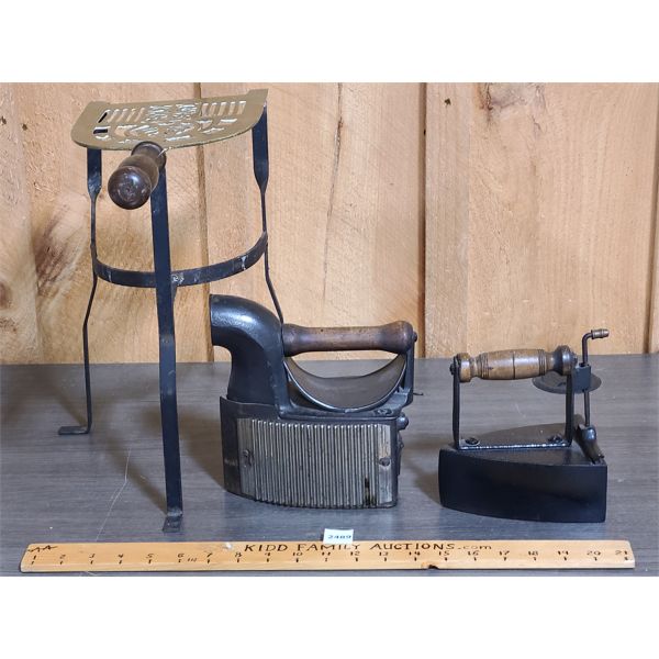 LOT OF 3 - ANTIQUE IRONS AND IRON STAND W/ BRASS TOP