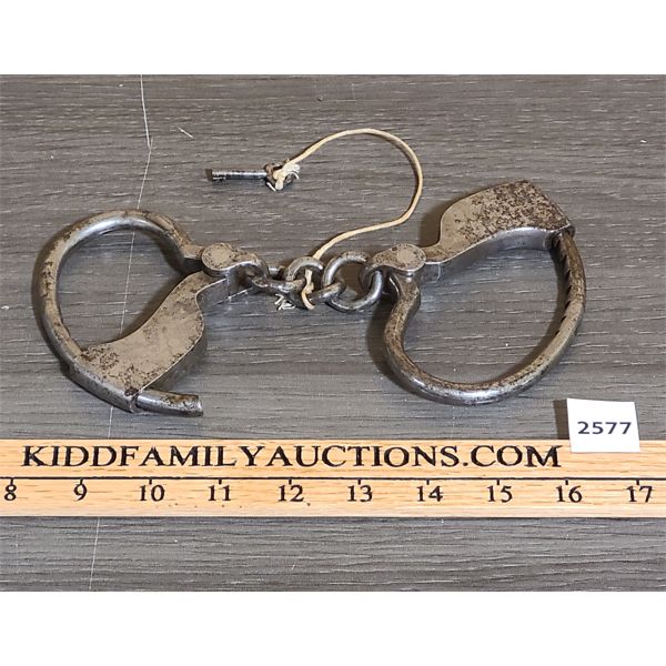 PAIR OF ANTIQUE HAND CUFFS - CIRCA 1890