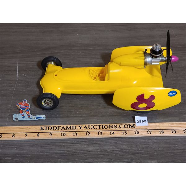 PLASTIC COX SHRIKE MOTORIZED RACE CAR