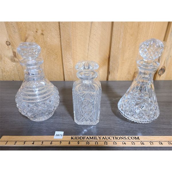 SET OF 3 HEAVY CUT GLASS DECANTERS 