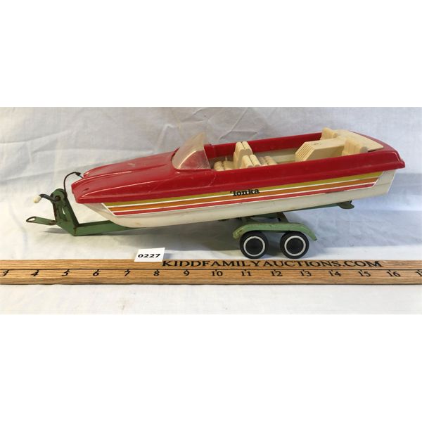 PLASTIC TONKA BOAT W/ METAL TRAILER