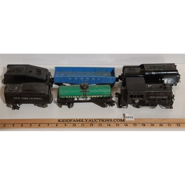 LOT OF 6 - LIONEL UNITED STATES ARMY LOCOMOTIVE AND MISC PLASTIC AND METAL TRAIN CARS