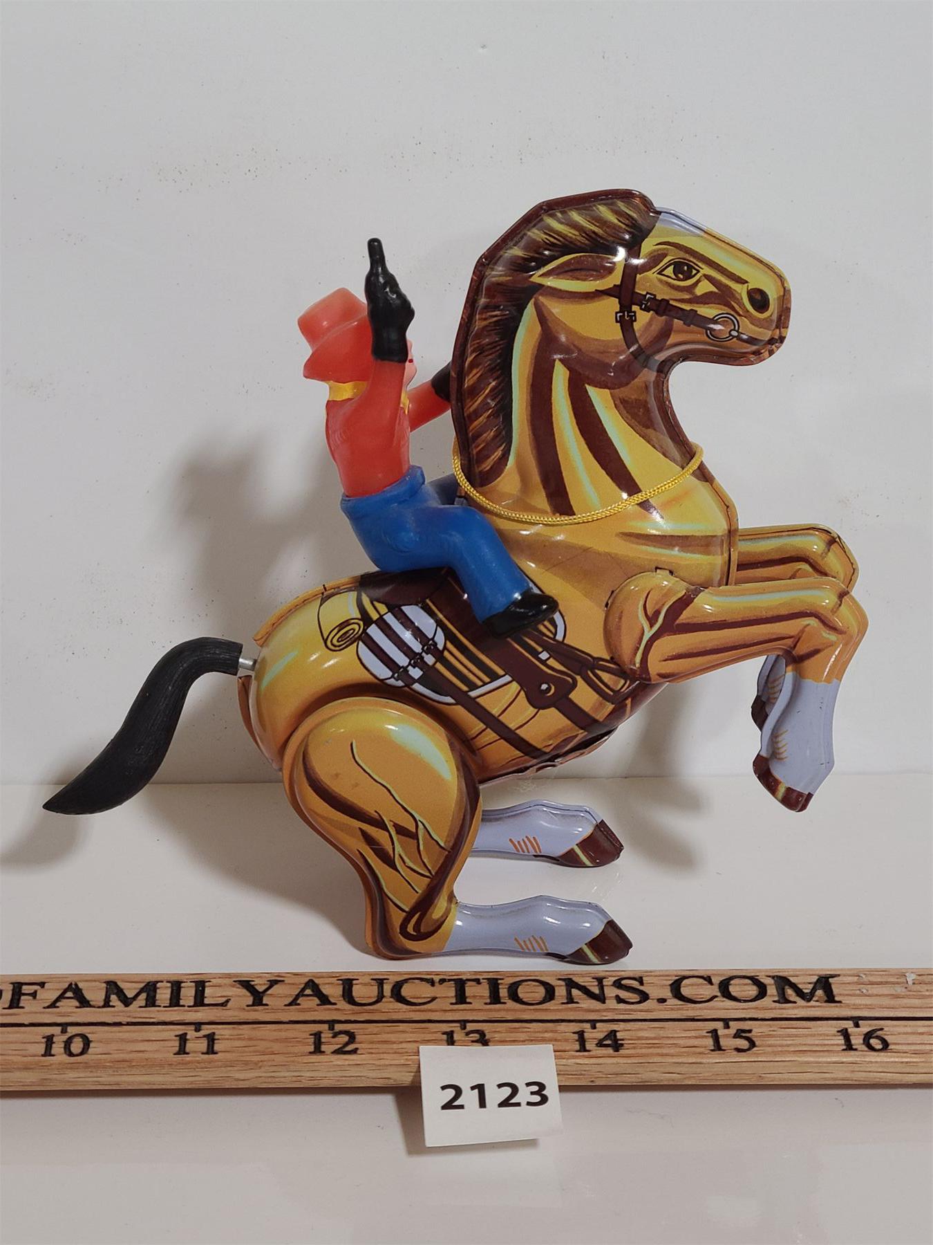 WIND-UP TIN RODEO HORSE W/ PLASTIC RIDER - MTU MADE IN KOREA