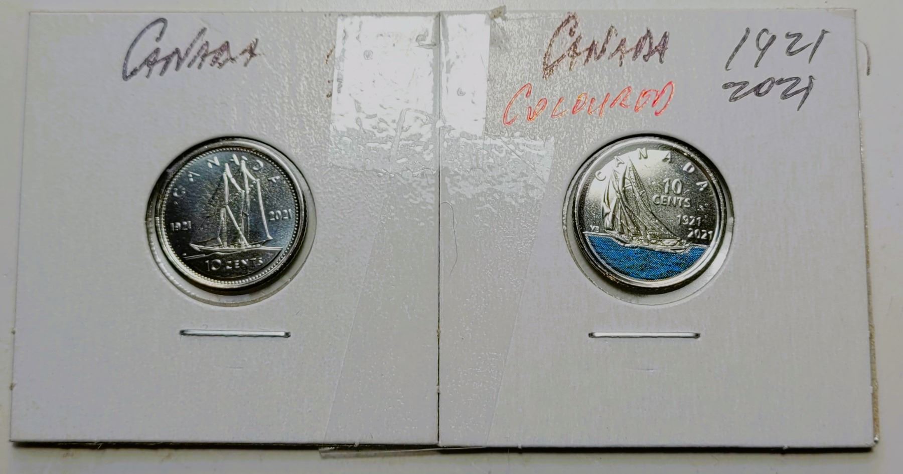 10) LOT OF 2 COLORIZED CANADIAN DIMES , 1921-