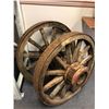 Image 2 : Pair of antique wooden wagon wheels w/ metal banding - approx. 2 1/2ft diameter