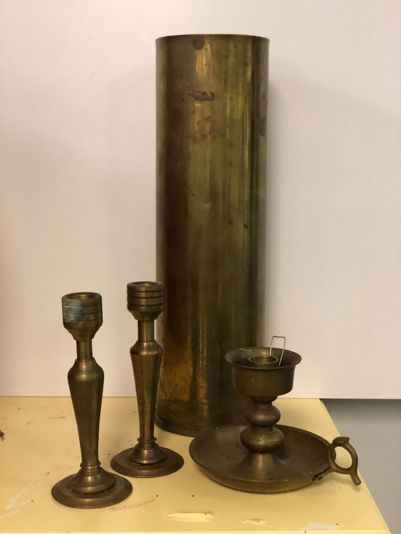 4 antique brass collectibles World War II artillery shell casing