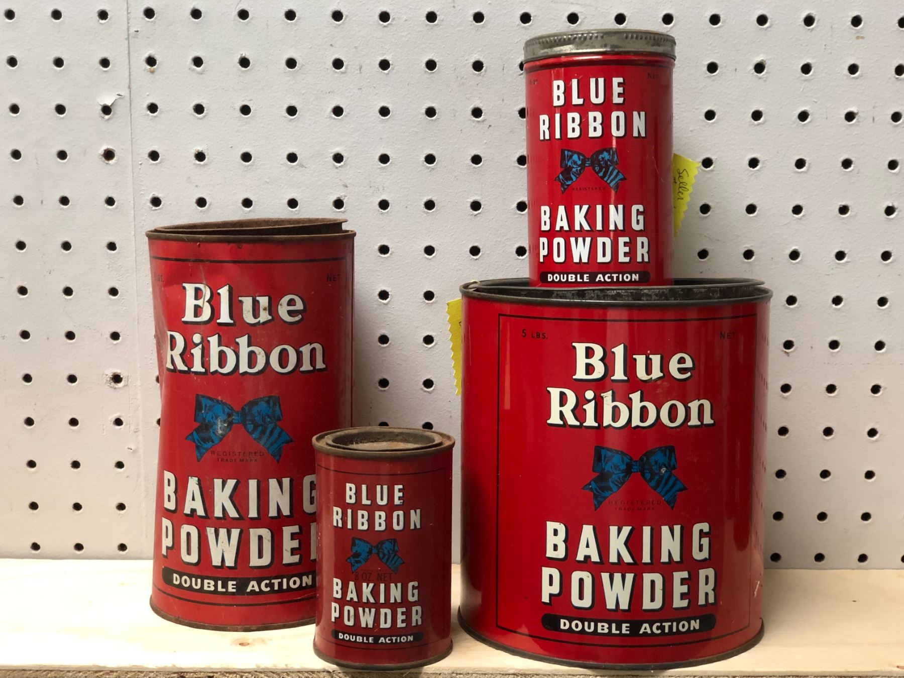 Group of 4 early 1900s Blue Ribbon baking powder collectors' tins