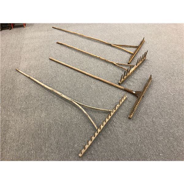 Group of 4 rustic wooden handmade hay rakes