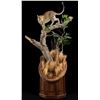 Image 1 : BRUSH COUNTRY STUDIOS: Life-Size Leopard Taxidermy Mount and Julian & Sons Black Walnut Pedestal Bas