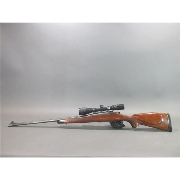 Remington Model 700 Bolt Action Rifle- 7MM Mag- 24" Barrel- Checkered- Center Point 3X9 Scope- Good 
