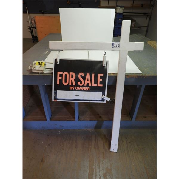 "For Sale" sign post with ground mount holder
