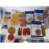 Image 4 : Assorted amber and red lens covers, amber and red reflectors, wire stripping knife, 12 V switches, a