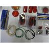 Image 6 : Assorted amber and red lens covers, amber and red reflectors, wire stripping knife, 12 V switches, a