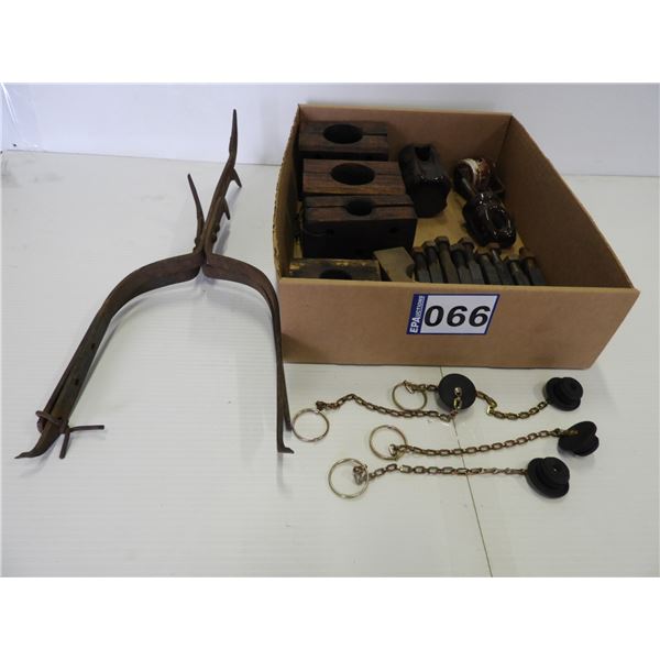 (4.5) Wooden block bearings, electical insulators, (9) 6" harrow spikes, (4) hydraulic coupler plugs