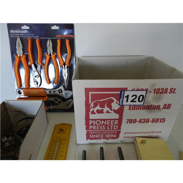 Plier and wrench set (new), hose clamps and sprocket (new), eye bolts,(6) assorted locks, chain, pap