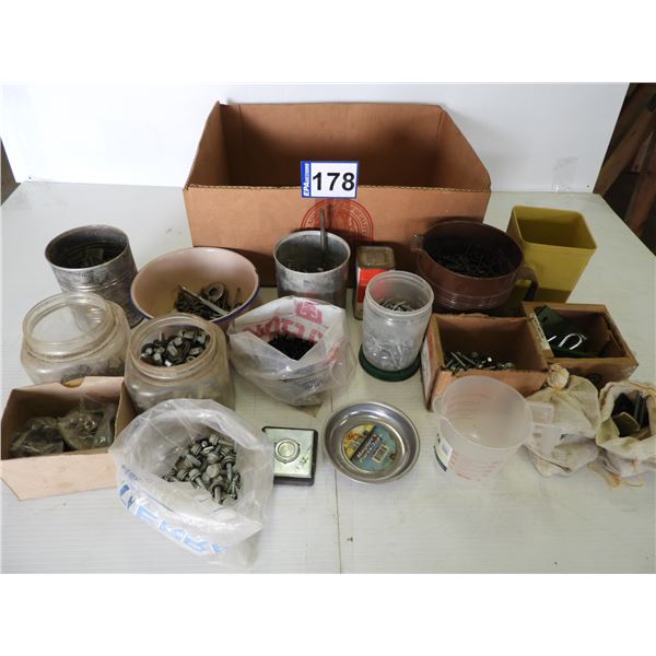 250ml measuring cup (unused), magnetic tray, speaker magnet, large assortment of screws and bolts 25