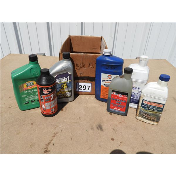 (7) Jugs 2 cycle motor oil- 3 full and 4 part full