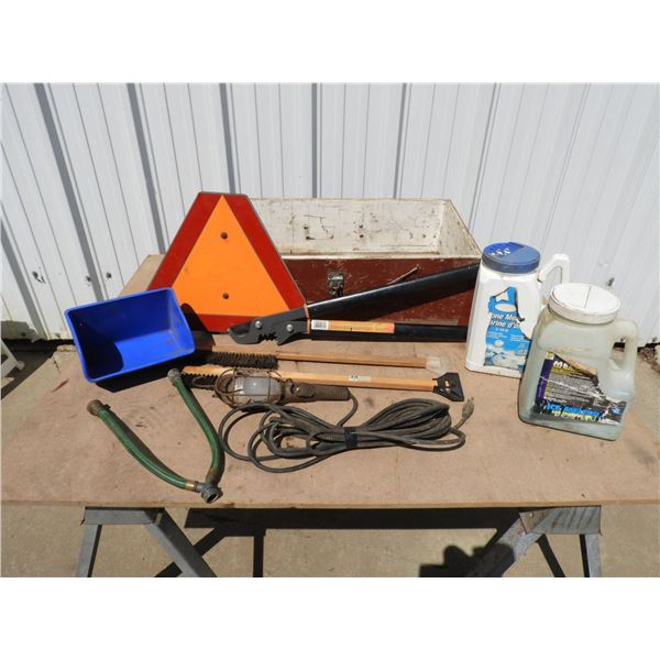 Y-hose, Fiskars tree pruners,(2) snow brushes, slow moving sign, blue plastic cup, trouble light, wo