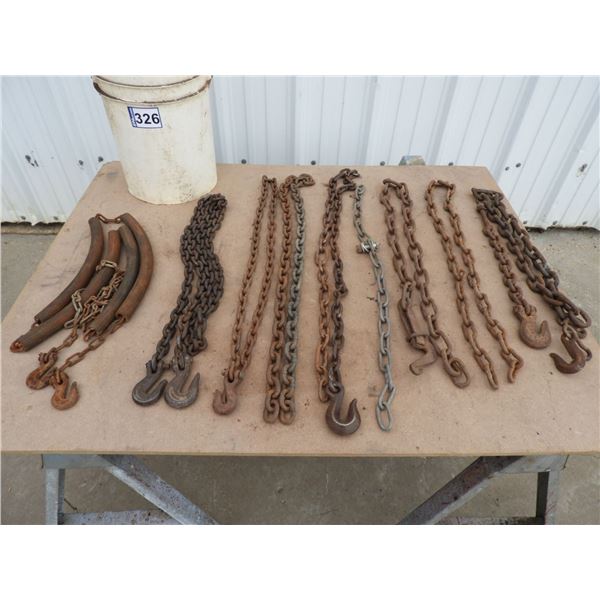 Assorted chains 3/16"x 10 ft tow chain with 2 hooks, 5/16" 8 ft tow chain with two hooks, (8) chain