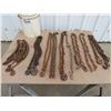 Image 1 : Assorted chains 3/16"x 10 ft tow chain with 2 hooks, 5/16" 8 ft tow chain with two hooks, (8) chain