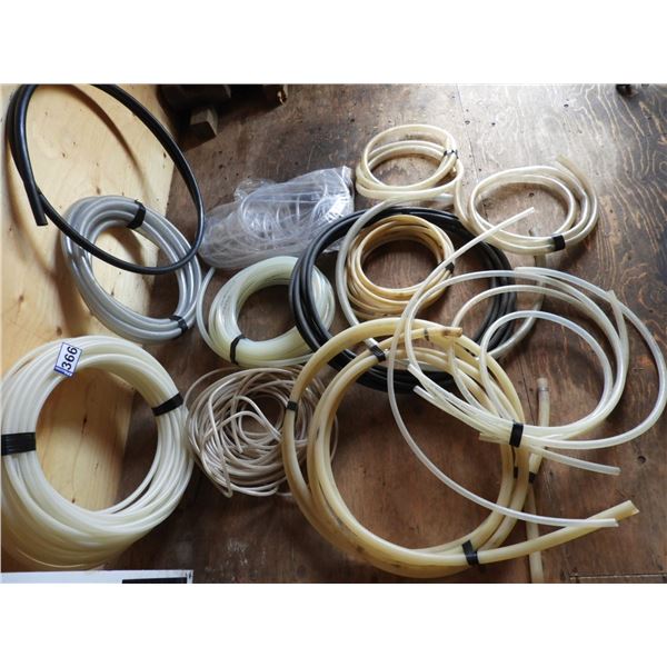 Lots of assorted hoses- 3/8-3/4" and weeping tile (new), clear, black and reinforced hoses(unused),