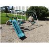 Image 2 : Swing set with 2 swings, ladder, two seat swings, right leg has a lower bend in it