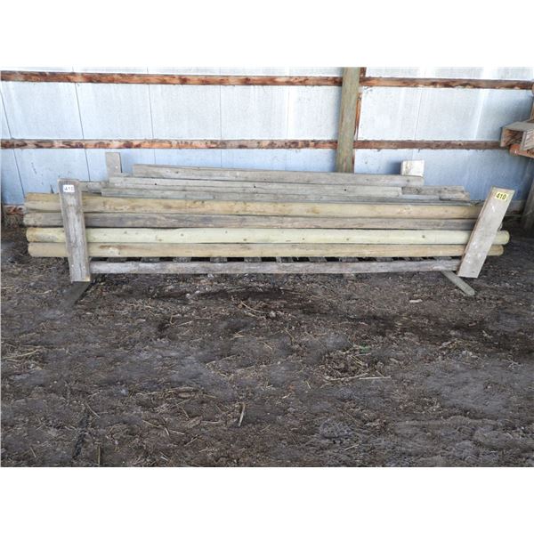 (32) 12 ft Treated fencing rails 4-5" (new/ unused), (3) treated 3-4" fence rails (used)