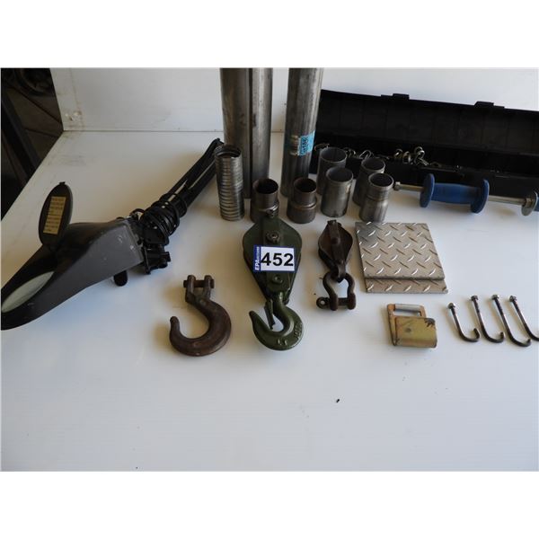 (2) Snatch block with hook, exhaust pipe extentions (unused), aluminum plates, dent puller kit, chai