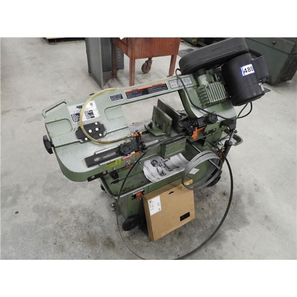 7' x 12" Hydraulic metal cutting band saw, works very well, comes with (3) new blades