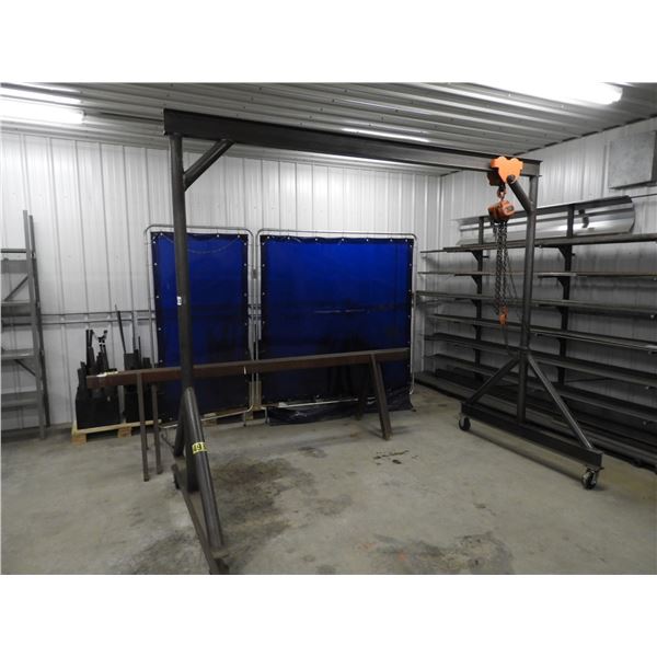 Overhead chain hoist stand on 5" castors 10ft L x 5ft W base x 102"H, top eyebeam 5" x 3", c/w 1 ton