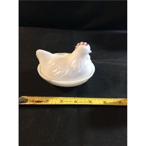 Vintage milk glass hen on a nest