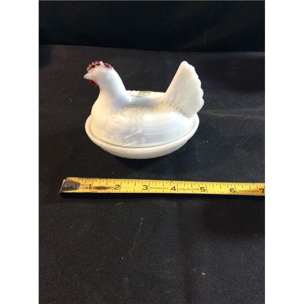 Vintage milk glass hen on a nest