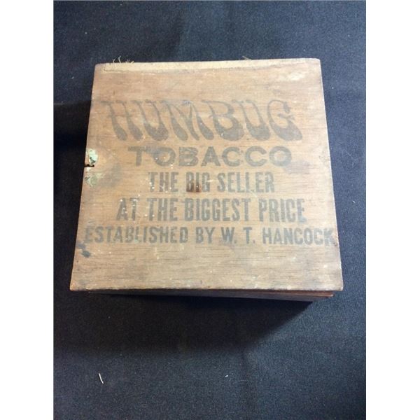 Humbug  tobacco the big seller at the biggest price wooden cigar box