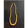 Image 1 : Orange beaded necklace