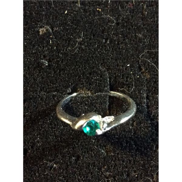 Size 6 1/2 green stone ring