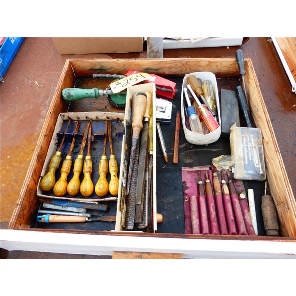 Box of Chisels, Tape Line and Sharpening Stone