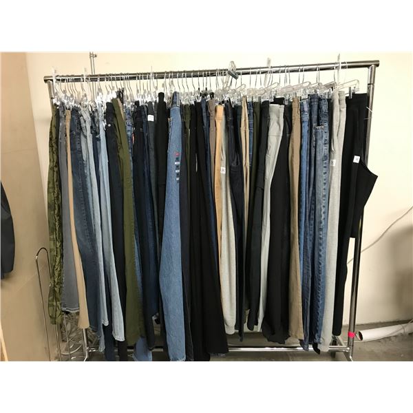 RACK OF ASSORTED SIZED PANTS (MANY NEW WITH TAGS) BRANDS INCLUDE; REIGNING CHAMP LEVI'S, BUFFALO,...