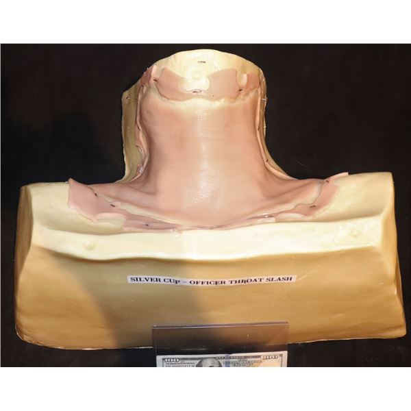 SILICONE THROAT SLASHING APPLIANCE ON NECK FORM