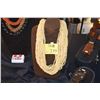 Image 1 : 10 STRAND SOUTH PACIFIC SHELL LEI (YELLOW) (DOES NOT INCLUDE STAND)