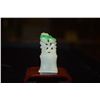 Image 1 : APPLE GREEN JADEITE CHOP ON STAND