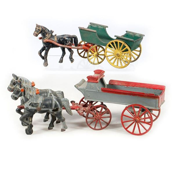 Two Cast Iron Horst Drawn Wagons