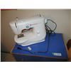 Image 2 : Singer M2100 with stand 23x14