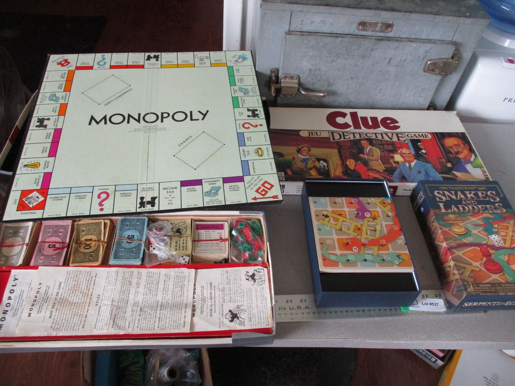 (4) Board games Monopoly Clue Snakes   Ladders Trivial Pursuit (4) Board games Monopoly Clue Snakes   Ladders Trivial Pursuit
