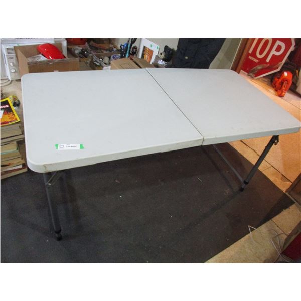 Small folding table - 47" long (23"tall extendable legs)