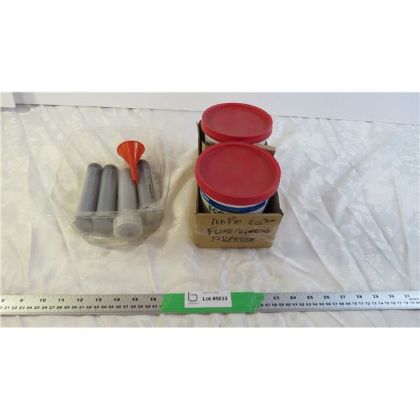 Floor covering adhesive and plastic syringes