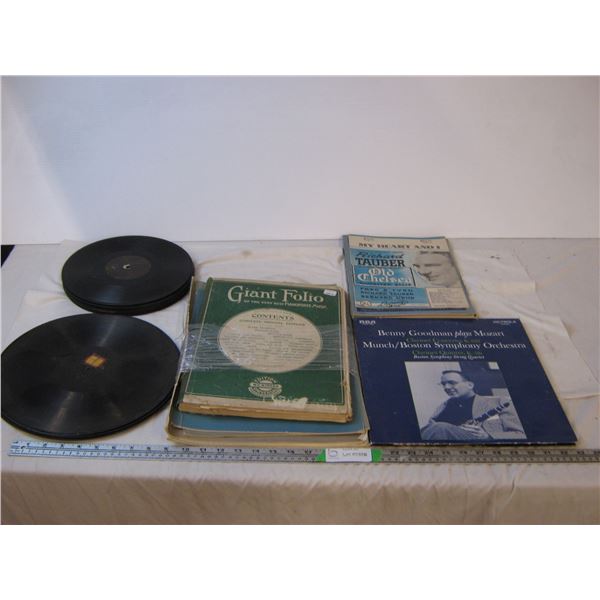 Several records and several booklets of assorted music