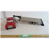 International truck with custom flat deck trailer - 34" total length