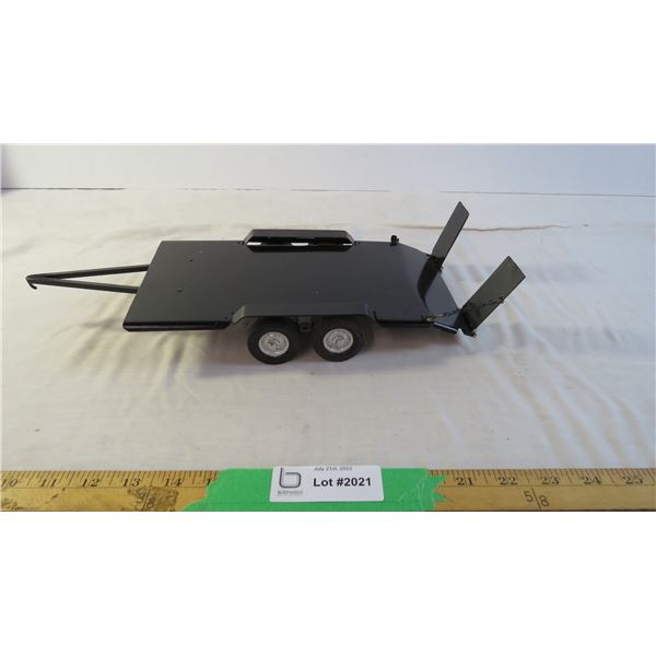 Custom black flat deck trailer