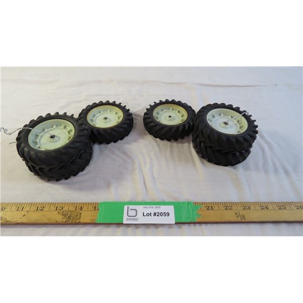 (6) assorted toy tractor tires