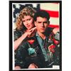 Image 1 : TOM CRUISE AND KELLY MCGILLIS SIGNRD TOP GUN 8 X 10 (RA COA)